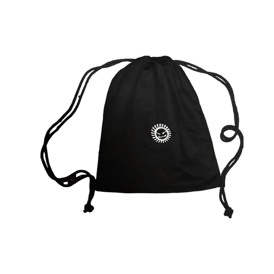 A black drawstring backpack with a white circular sunburst logo on the front, displayed against a solid white background.